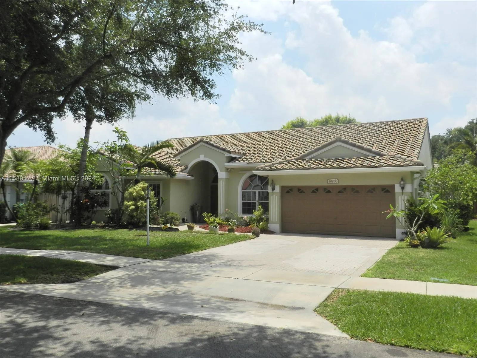 Fantastic curb appeal with 2 car garage and ample driveway