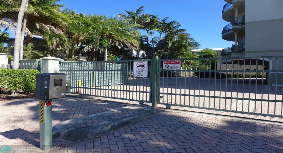 Gated entry to covered parking and 2nd space