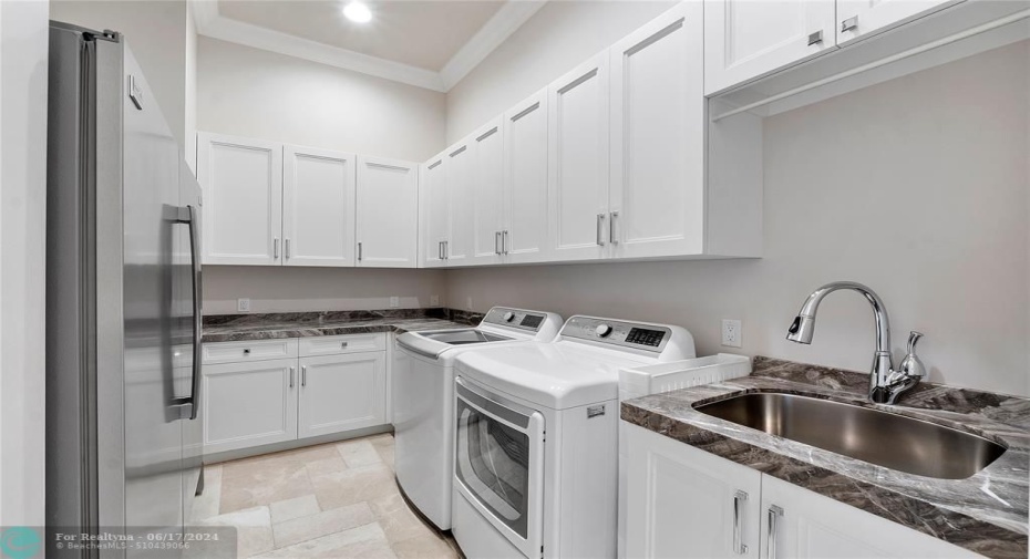 Laundry Room with Oversize refrigerator and freezer