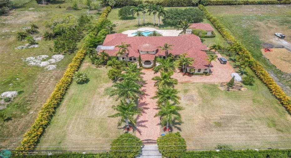 Tropical Paradise on 2+ acres with Private landscaping