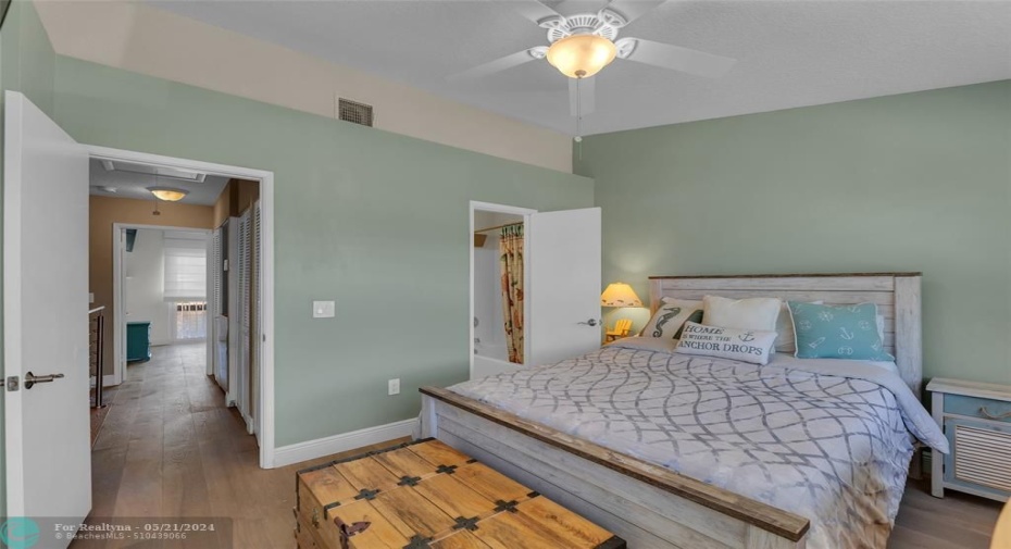 Second bedroom offers overhead ceiling fan and lighting