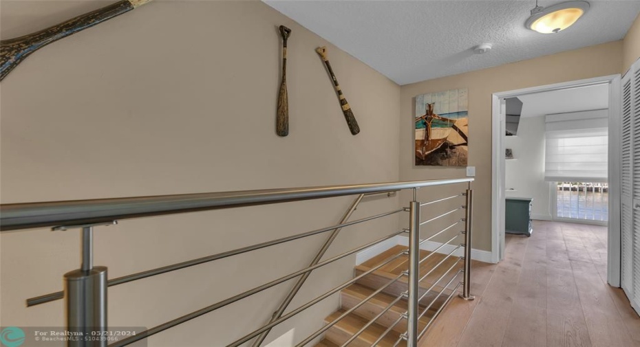 Open railing on second story  with great closet and storage space