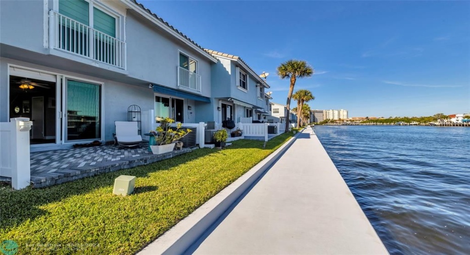 Seawall, grass and pavered patio separate you from the main intracoastal