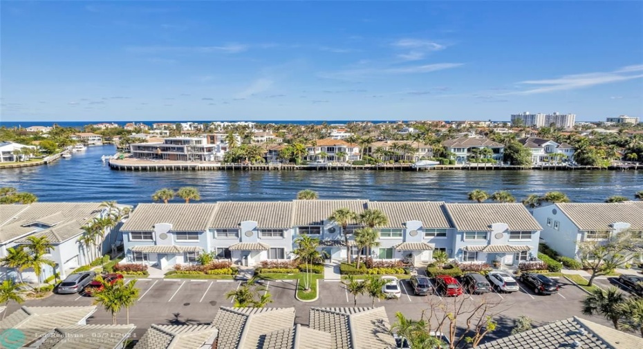 Meticulously landscaped and maintained right on the water in east Boca