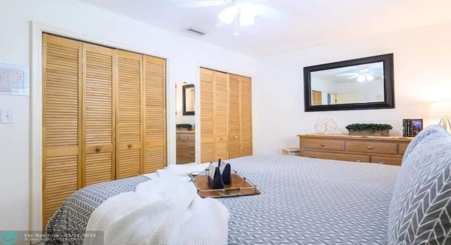 The Master bedroom has a queen-size bed, with a good-sized closet.