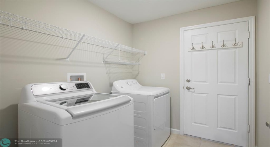 Laundry room includes the washer and dryer.