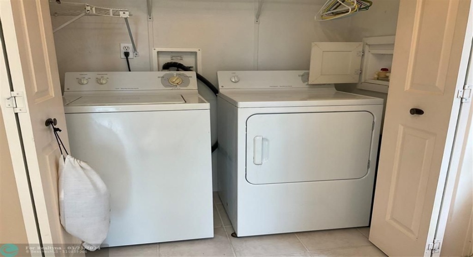 Laundry closet with water turnoff