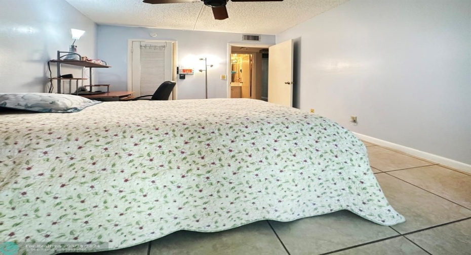 Bedroom w/Tile Floor & Ceiling Fan