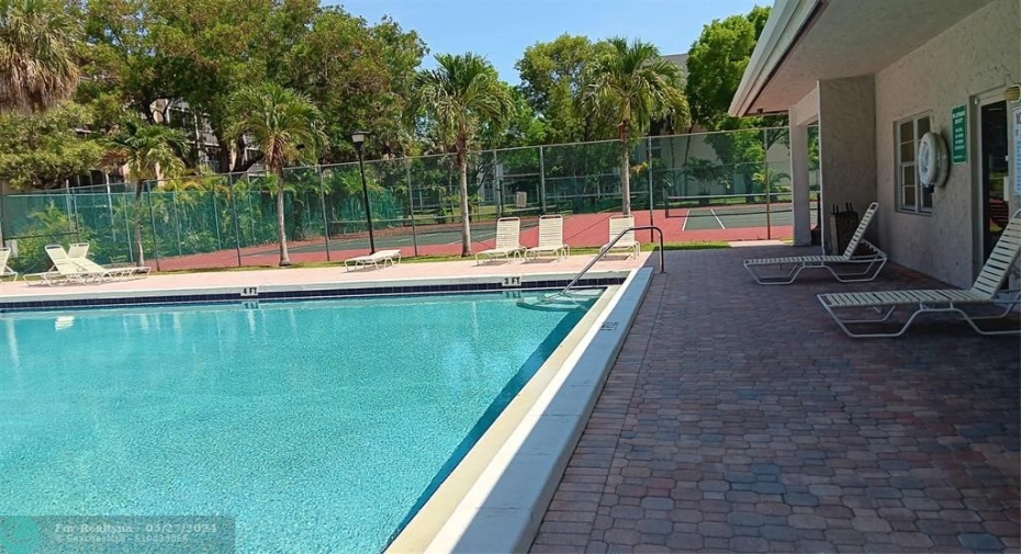 Pool area, tennis courts and clubhouse