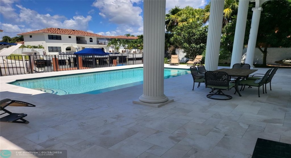 New marble deck and resurfaced pool.