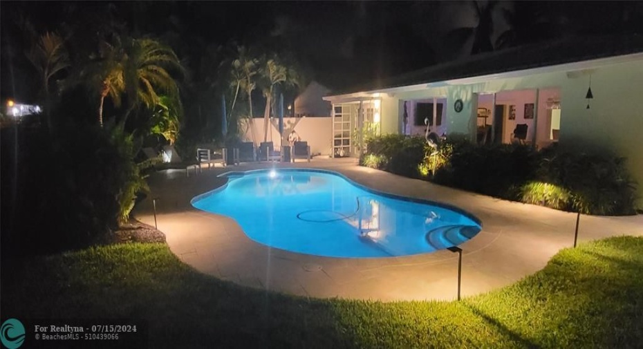 Night view of pool (pool light is LED and color changing)