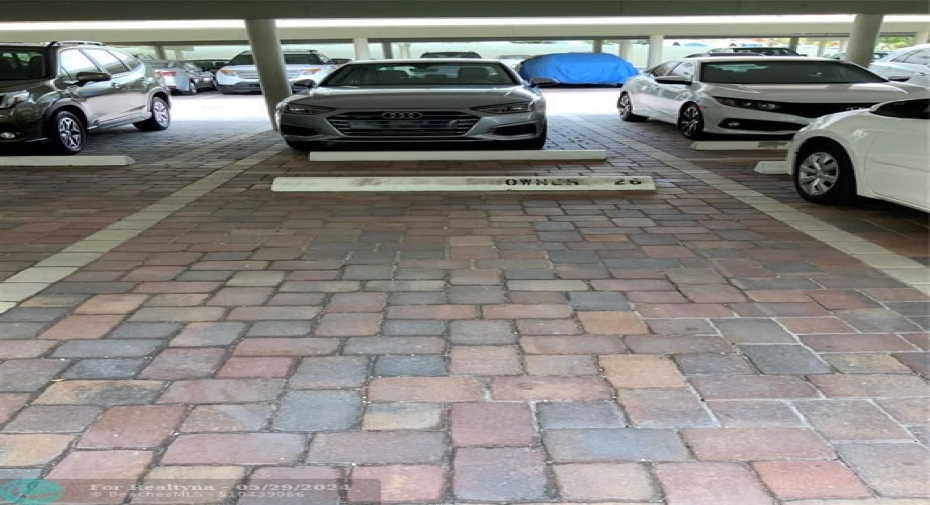 Premier covered  parking space at the lobby entry