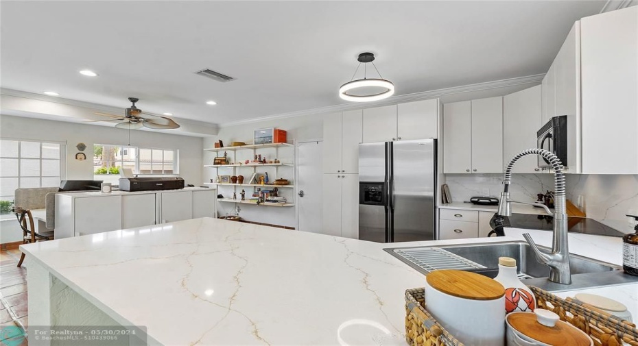 Digitally edited to depict white cabinetry in kitchen & wetbar