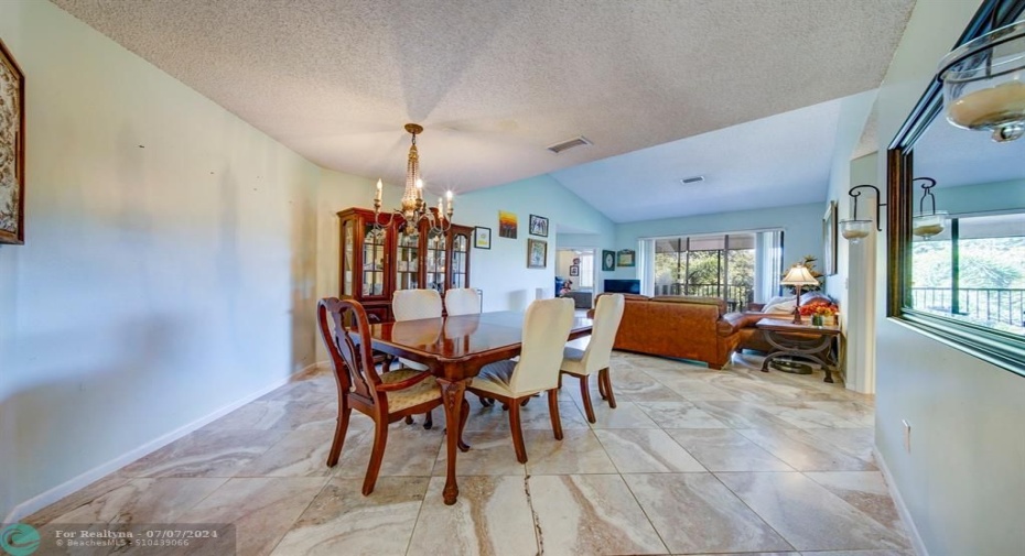 Your condo has beautiful vinyl tile floors and high ceilings