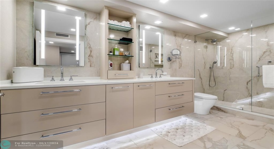 Dual Sinks, custom wood cabinets, dual mirrors, large walk-in shower and toto toilet