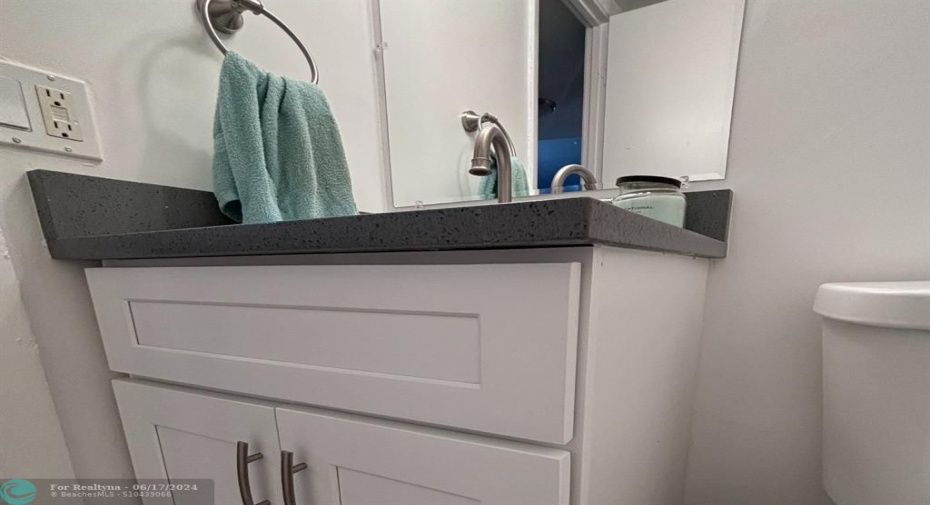 1/2 Bath Newer Vanity and commode