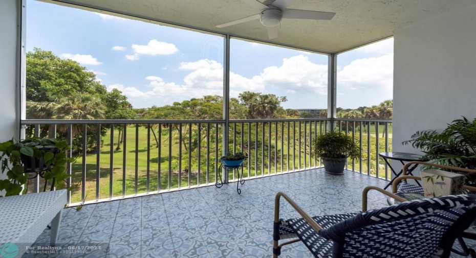 large updated balcony about 15 feet wide.This ia off the primary bedroom . expansive serene view