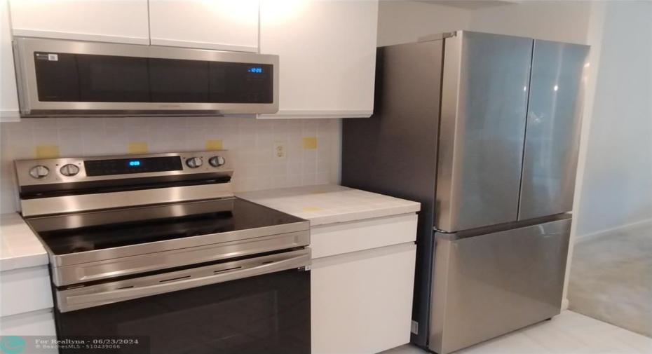 Brand New Stainless Steel Appliances