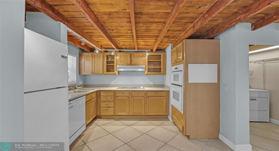 Lots of charm in this kitchen with the wood ceiling!