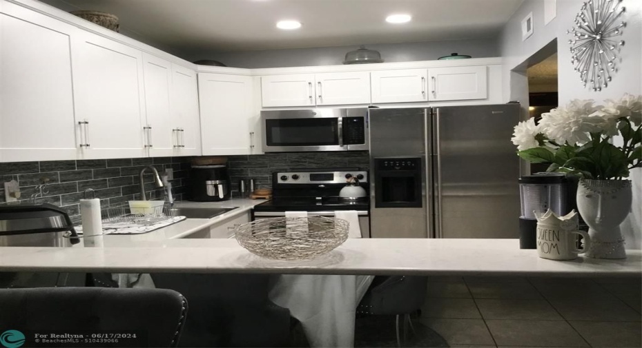 Upgraded kitchen cabinets and quartz countertops