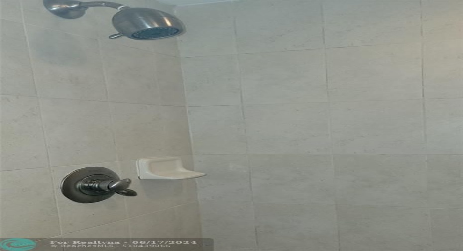Primary BathWalk-In Shower & Granite Countertops