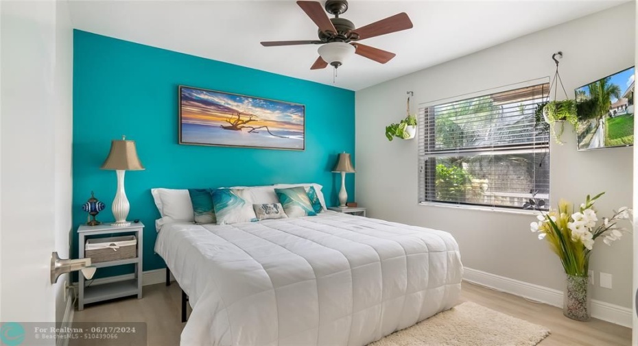 Enjoy the warm sunlight and relaxing vibes in this large room, serenely tucked away. Equipped with custom closet organizational system that allows you to maximize the space in the bedroom.