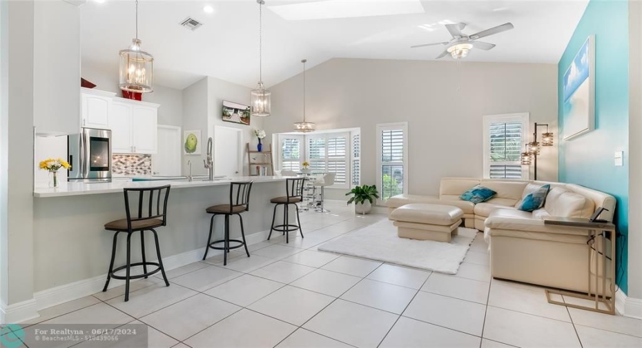 Dreamy Open Layout to make memories in this sunlit open-concept space where the family room seamlessly flows into sleek modern kitchen and elegant dining area, or walkout to the covered patio and enjoy life of luxury by the pool!