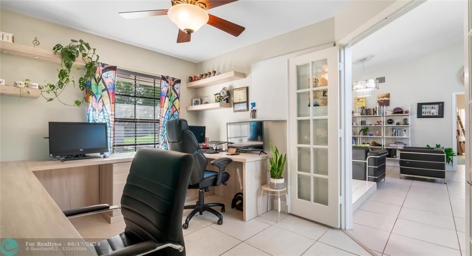 Luxury Home Office HavenStep through the elegant French doors and discover a true work-from-home oasis in this impeccably designed custom office space. Blending sophistication with intelligent functionality, it provides the perfect upscale setting for focused productivity.