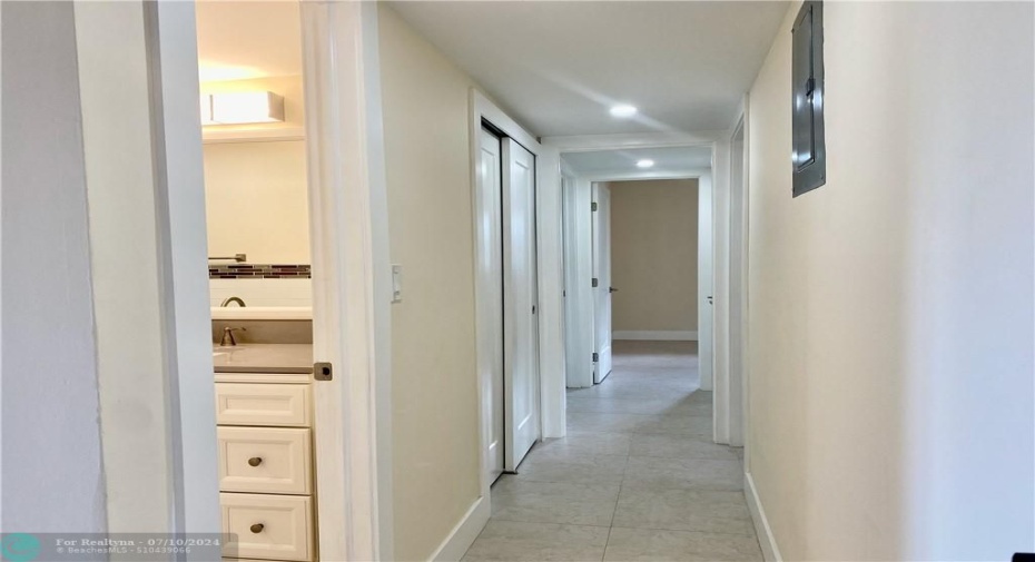 Hallway entry to the 3 bedrooms