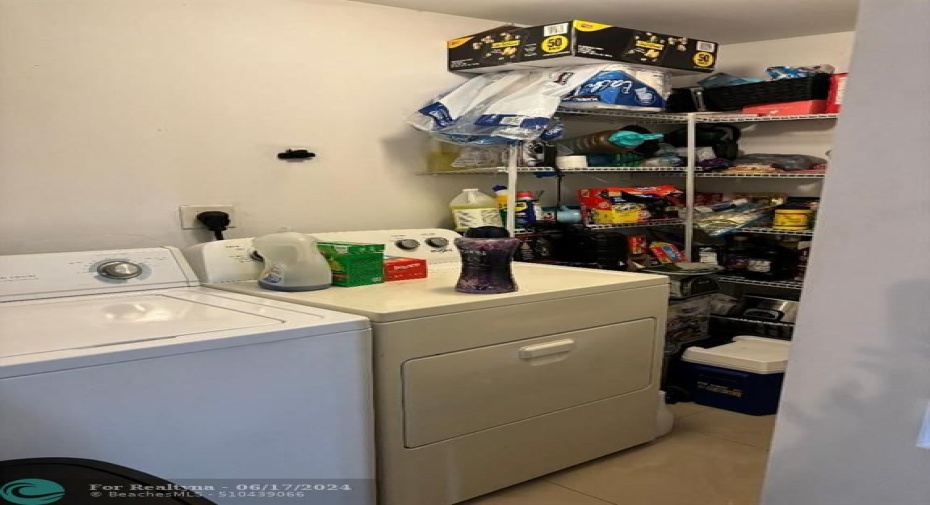 large laundry room and pantry