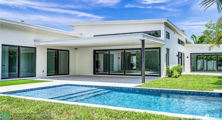 Linear roof lines and a modern rectangular pool