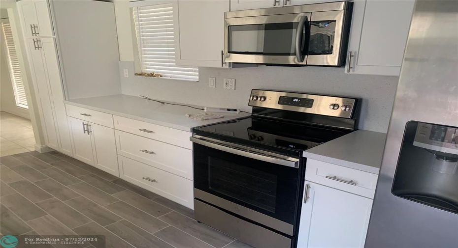 BEAUTIFUL NEWER GALLEY KITCHEN