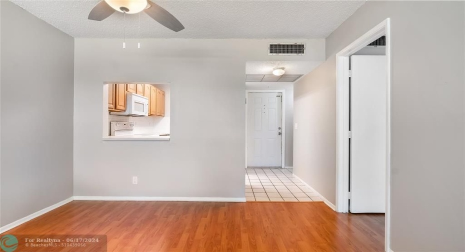 Dining area with convenient pass through to the kitchen.