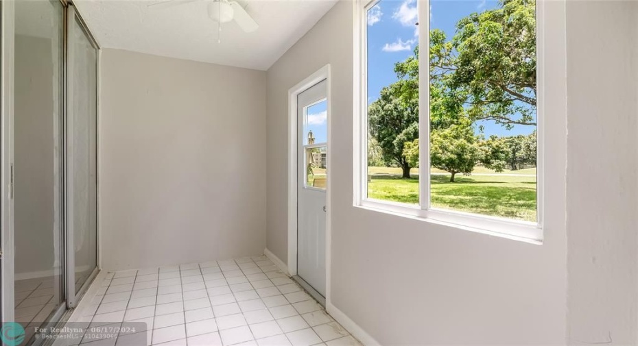 Enclosed patio with expansive golf views!