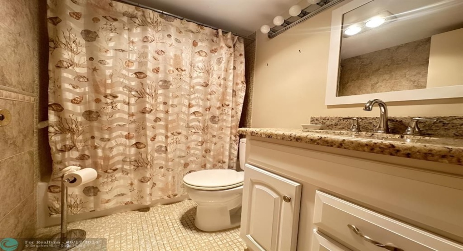 Primary Bathroom with Tile & Granite Counters