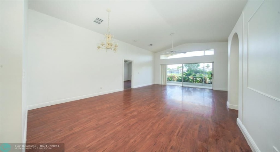 Your living/dining area.  Notice the high ceilings.  The home is very light and bright.
