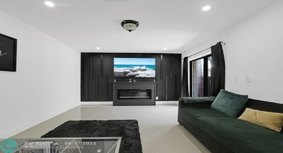 Accent wall with built-in mounted electrical fireplace