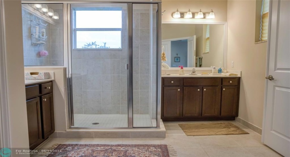 Spacious walk-in shower to enjoy after a long day.