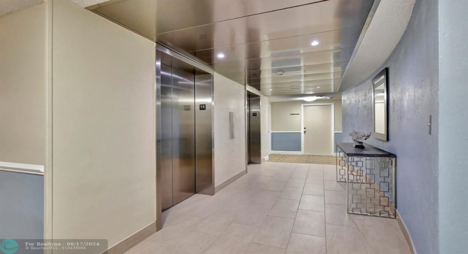 Elevator on hallway of unit