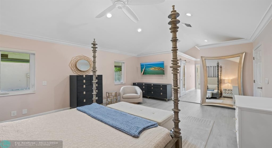 Oversized Primary Suite With A Vaulted Ceiling & 2 Custom Walk-In Closets.