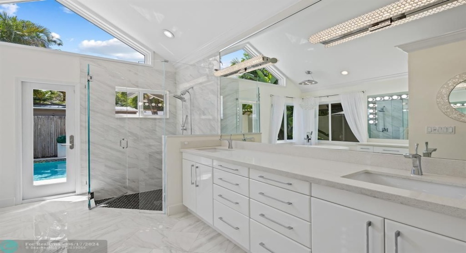 Primary Bathroom with Large Soaking Tub For Two, Custom Vanity With Lighting & Crystal Chandelier