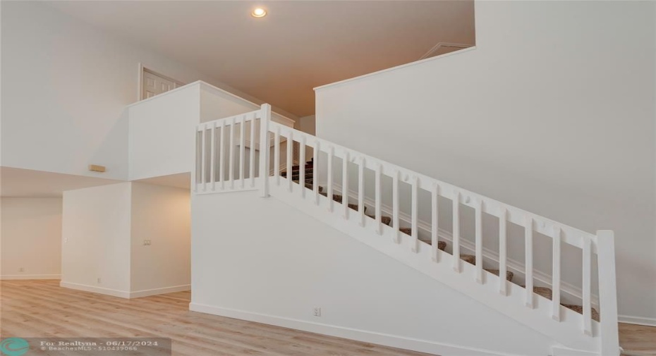 Stairs leading to bedrooms and loft