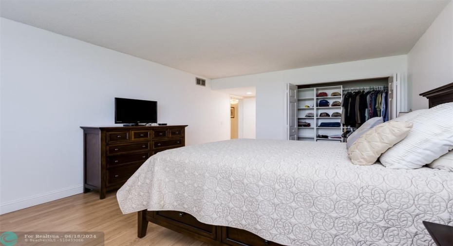 Master Bedroom has 3 closets, one double closet with custom storage, one linen closet and a walk-in closet