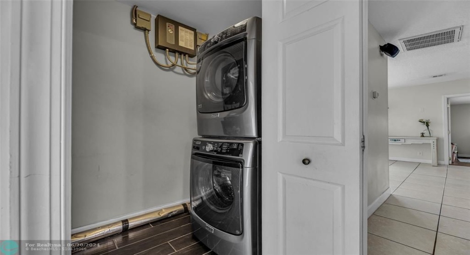Stackable washer and dryer located inside the home