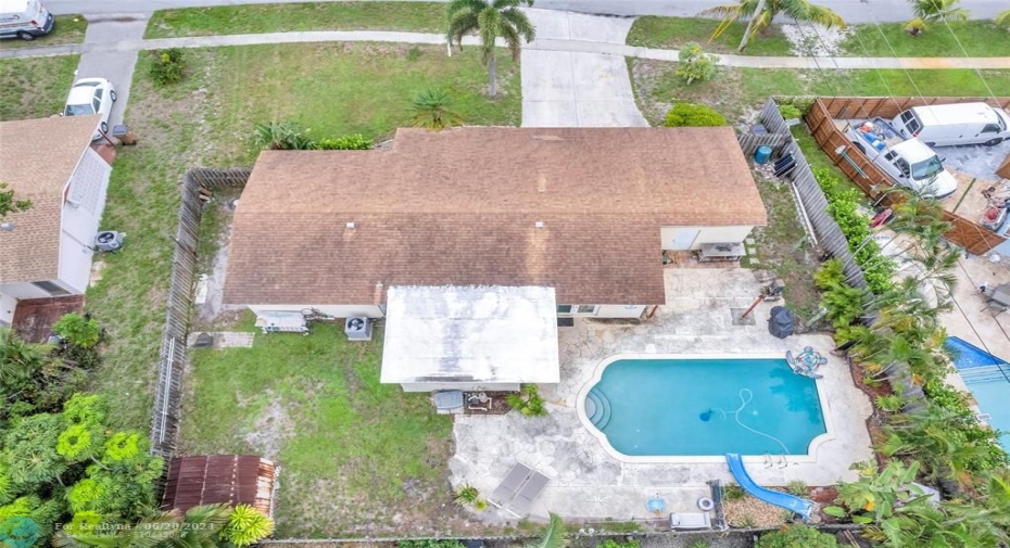 Large private fenced yard with pool located in Deerfield Beach