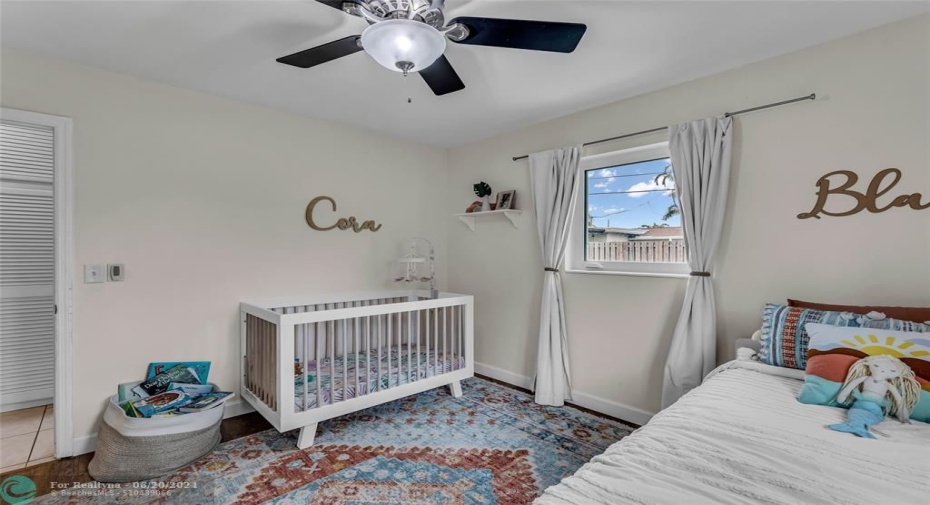 Second Bedroom with great natural light in addition to overhead ceiling fan and lighting