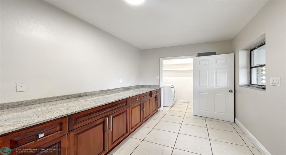 Walk-thru pantry, just off the kitchen, leads to the laundry room (lots of storage), and even an exterior entrance to deliver your groceries and supplies directly to kitchen and pantry area.