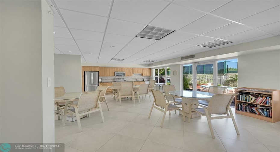 Kitchen and sitting area next to pool