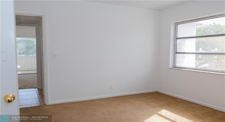 spacious bedroom. Carpet Out, Brand New plank tile flooring in!!!