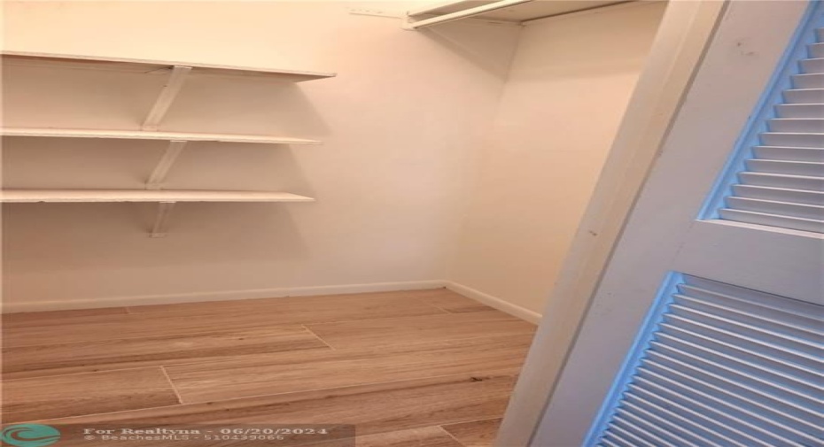 2nd bedroom with a walk-in closet